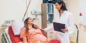 pregnant-woman-preparing-for-delivery-picture-id1089689622.jpg