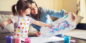 cute-little-girl-painting-with-mommy-together-at-home-portrait-of-picture-id1142677960.jpg