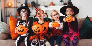 happy-halloween-a-group-of-children-in-suits-and-with-pumpkins-in-picture-id1173945659.jpg