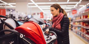 young-beautiful-pregnant-woman-choosing-infant-car-seat-shopping-for-picture-id1155403464.jpg