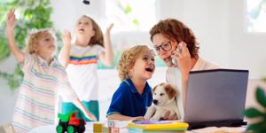 mother-working-from-home-with-kids-quarantine-picture-id1218495383.jpg