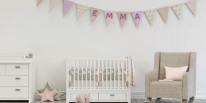 modern-nursery-with-decorated-flags-with-name-emma-picture-id1002593178.jpg