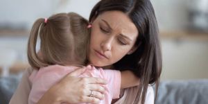 worried-young-foster-mother-comforting-embracing-adopted-child-picture-id1191083789.jpg
