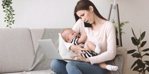 mother-holding-crying-baby-and-calling-to-pediatrician-for-advice-picture-id1184171819.jpg