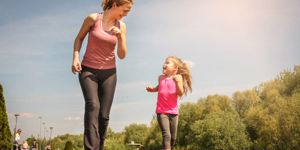 caucasian-mother-and-daughter-jogging-outdoors-mother-and-daughter-picture-id696868854.jpg