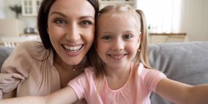 happy-young-mom-and-little-daughter-making-selfie-picture-id1204066320.jpg