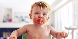 baby-boy-eating-spaghetti-picture-id950706262.jpg