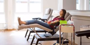 young-woman-lay-on-back-while-she-is-donating-blood-picture-id1007273722.jpg