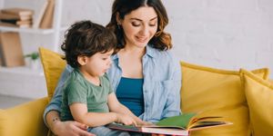 mum and son toddler reading