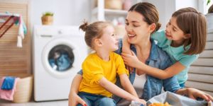 family-doing-laundry-picture-id1180198860.jpg