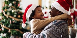 father-and-son-are-enjoying-christmas-holiday-picture-id875180066.jpg