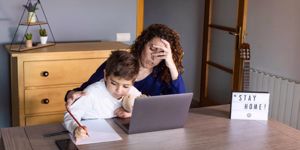 mum working from home with child