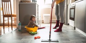 mum mopping with baby 
